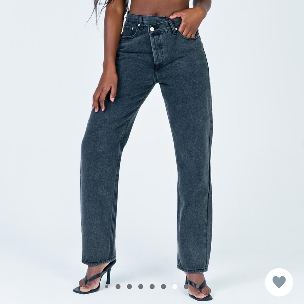 Black asymmetrical denim jeans